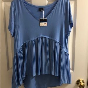 Blue top with accordion style detail